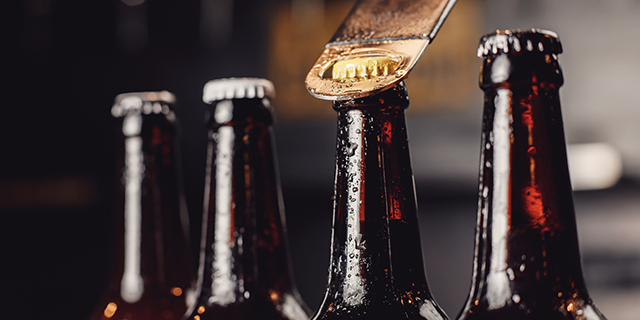 alcohol free beer bottles being opened alcohol free beer bottles being opened